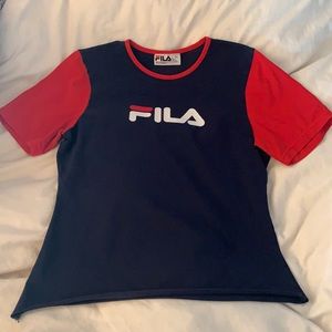 Fila t shirt, great condition. Slightly cut bottom to make for a perfect fit!